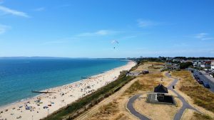 Aerial view of Bournemouth beach and coastline from a drone