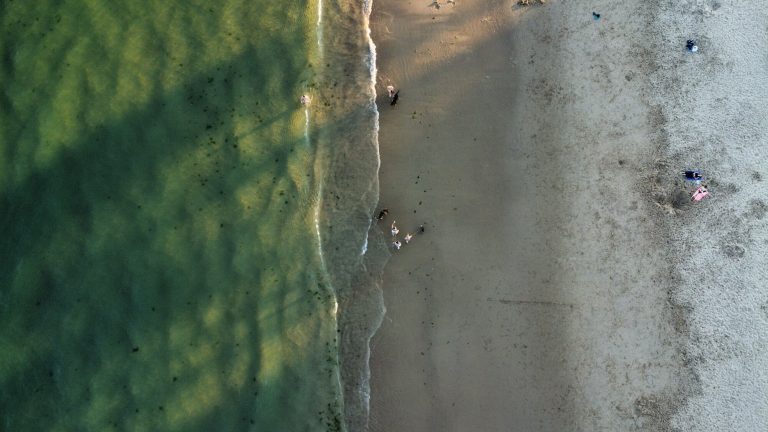 Aerial view of Bournemouth beach and coastline from a drone